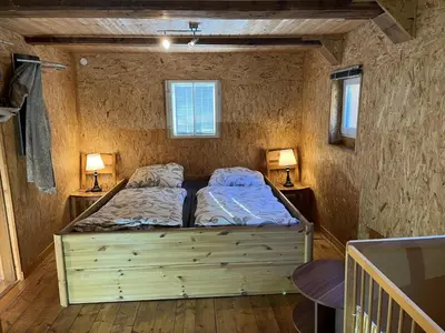 Ein Bett oder Betten in einem Zimmer der Unterkunft Ferienwohnung 