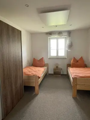 Ein Bett oder Betten in einem Zimmer der Unterkunft Pension Böhmer
