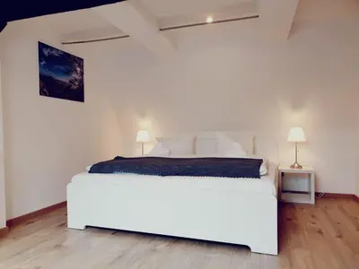 Ein Bett oder Betten in einem Zimmer der Unterkunft Lindenhof Apartments Bad Schandau
