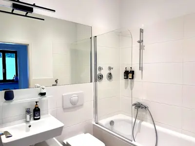 Ein Badezimmer in der Unterkunft YR Apartment - Glasfaser, WLAN, Kaffee
