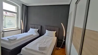 Ein Bett oder Betten in einem Zimmer der Unterkunft Ferienwohnung Eppendorf