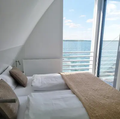 Ein Bett oder Betten in einem Zimmer der Unterkunft Ferienhaus Water