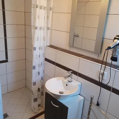 Ein Badezimmer in der Unterkunft Zimmervermietung Fuchs,