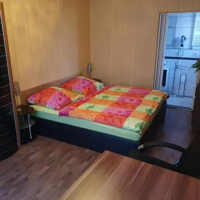 Ein Bett oder Betten in einem Zimmer der Unterkunft Zimmervermietung Fuchs,