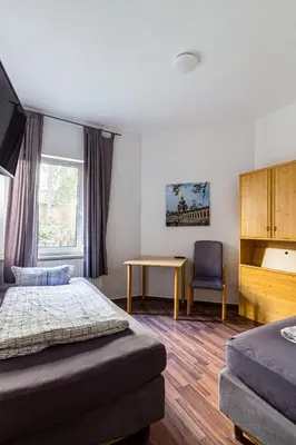 Ein Bett oder Betten in einem Zimmer der Unterkunft Apartmenthaus in Chemnitz für Monteure