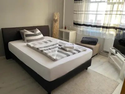 Ein Bett oder Betten in einem Zimmer der Unterkunft Villa Blue Max