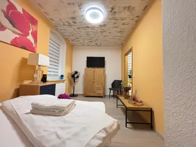 Ein Bett oder Betten in einem Zimmer der Unterkunft Villa Blue Max