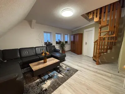 Ein Sitzbereich in der Unterkunft Villa Blue Max