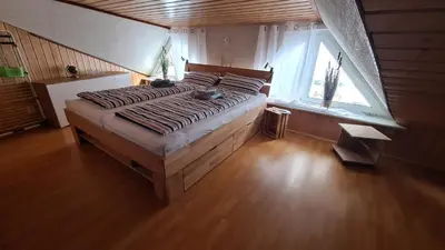 Ein Bett oder Betten in einem Zimmer der Unterkunft Ferienhaus Marx