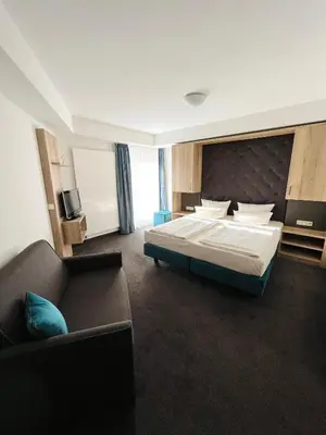 Ein Bett oder Betten in einem Zimmer der Unterkunft Modernes Apartment mit Blick zur Frauenkirche