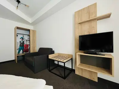 TV/Unterhaltungsangebot in der Unterkunft Modernes Apartment mit Blick zur Frauenkirche