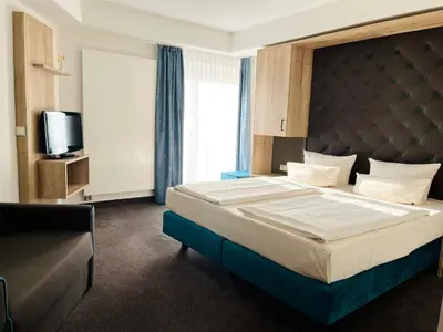 Ein Bett oder Betten in einem Zimmer der Unterkunft Modernes Apartment mit Blick zur Frauenkirche