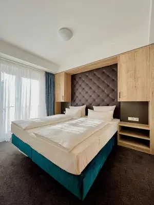 Ein Bett oder Betten in einem Zimmer der Unterkunft Familienapartment mit Panoramablick zur Frauenkirche