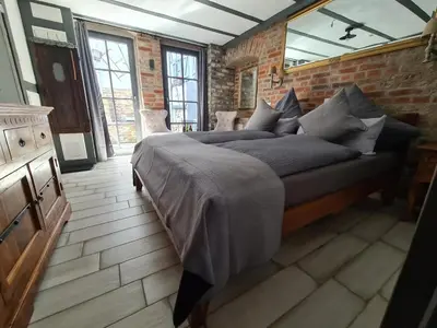Ein Bett oder Betten in einem Zimmer der Unterkunft Hotel b&b altes hinterhäusel