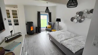 Ein Bett oder Betten in einem Zimmer der Unterkunft Ferienhaus im Wesenitztal
