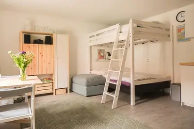 Ein Bett oder Betten in einem Zimmer der Unterkunft Haus Hummel Ferienwohnung Dora