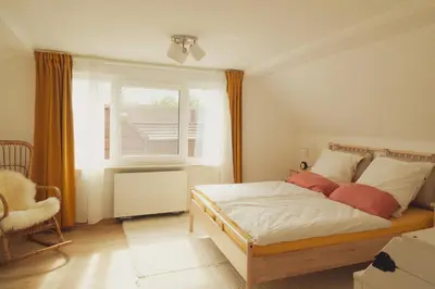 Ein Bett oder Betten in einem Zimmer der Unterkunft Haus Hummel Ferienwohnung Liese