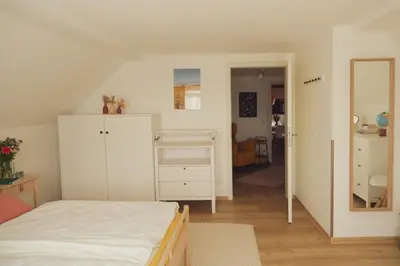 Ein Bett oder Betten in einem Zimmer der Unterkunft Haus Hummel Ferienwohnung Liese