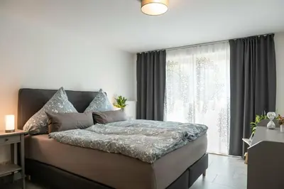 Ein Bett oder Betten in einem Zimmer der Unterkunft NEU! Ferienwohnung Andreas Radebeul