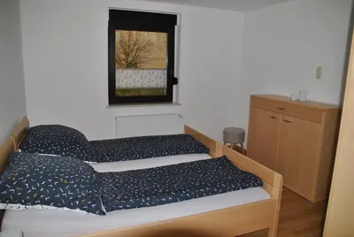 Ein Bett oder Betten in einem Zimmer der Unterkunft Fewo / Monteurswohnung Heller Nerchau