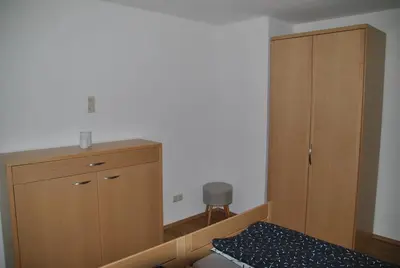 Ein Bett oder Betten in einem Zimmer der Unterkunft Fewo / Monteurswohnung Heller Nerchau