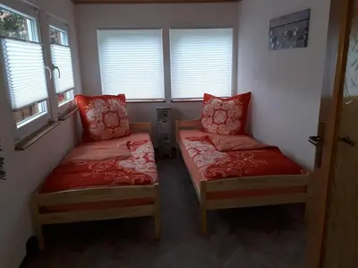 Ein Bett oder Betten in einem Zimmer der Unterkunft Bungalow blühende Oase