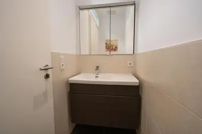 Ein Badezimmer in der Unterkunft Hochwertiges Apartment / 120m² / Dachterrasse / Parking