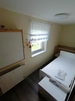 Ein Bett oder Betten in einem Zimmer der Unterkunft Ferienwohnung in Mittelsaida