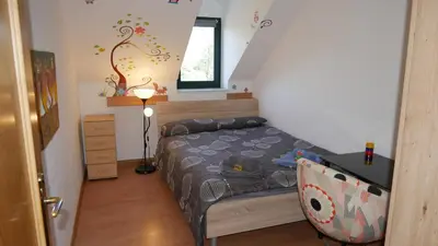 Ein Bett oder Betten in einem Zimmer der Unterkunft CasaColombia traumhafte Neustadt-Wohnung am Park