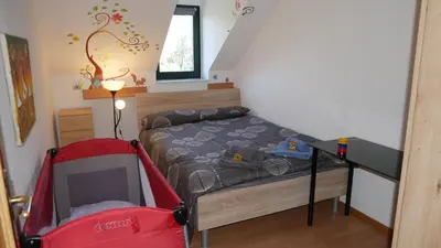 Ein Bett oder Betten in einem Zimmer der Unterkunft CasaColombia traumhafte Neustadt-Wohnung am Park