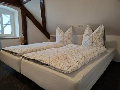 Ein Bett oder Betten in einem Zimmer der Unterkunft NEU! Ferienwohnung Hanka