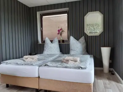 Ein Bett oder Betten in einem Zimmer der Unterkunft NEU Apartment Hanka