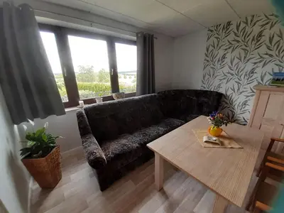 Ein Sitzbereich in der Unterkunft NEU Apartment Hanka