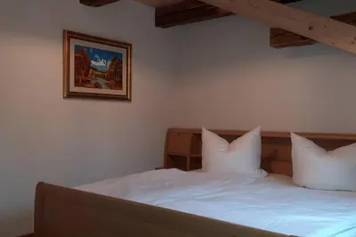 Ein Bett oder Betten in einem Zimmer der Unterkunft Erbgericht Putzkau