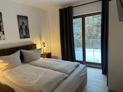 Ein Bett oder Betten in einem Zimmer der Unterkunft Chalet Ferienhaus Dresden