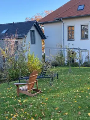Ein Garten an der Unterkunft Haus Charlotte - Kurort Gohrisch - Terrasse - Gartensauna - Parkplatz
