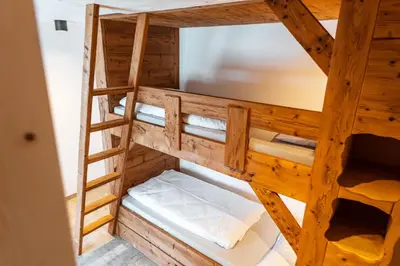 Ein Bett oder Betten in einem Zimmer der Unterkunft Zugspitze Apartment GLÜCK.AUF