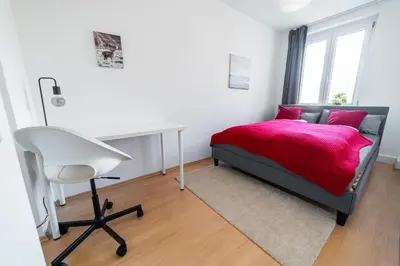 Ein Bett oder Betten in einem Zimmer der Unterkunft FullHouse - Chemnitz - HS46 - 3 Bedrooms - SmartTV