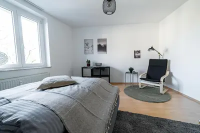 Ein Bett oder Betten in einem Zimmer der Unterkunft FullHouse - Chemnitz - HS46 - 3 Bedrooms - SmartTV
