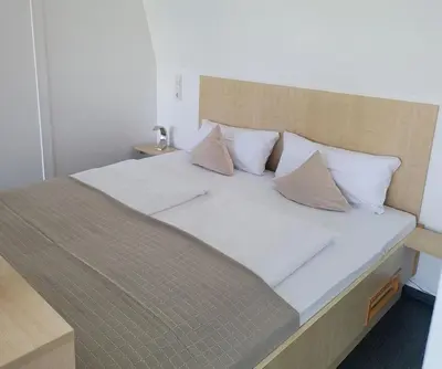 Ein Bett oder Betten in einem Zimmer der Unterkunft Appartment Seeblick 5