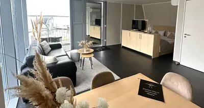 Ein Sitzbereich in der Unterkunft Appartment Seeblick 5