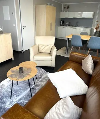 Ein Sitzbereich in der Unterkunft Appartment Seeblick 9