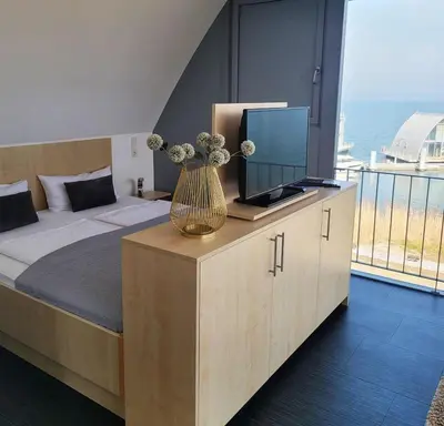 Ein Bett oder Betten in einem Zimmer der Unterkunft Appartment Seeblick 8