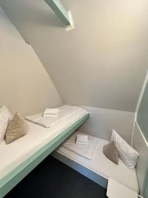 Ein Bett oder Betten in einem Zimmer der Unterkunft Appartment Seeblick 8