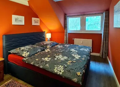Ein Bett oder Betten in einem Zimmer der Unterkunft ArtHouse Bad Schandau