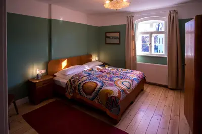 Ein Bett oder Betten in einem Zimmer der Unterkunft Holiday in quiet quarter, 20 min to city center