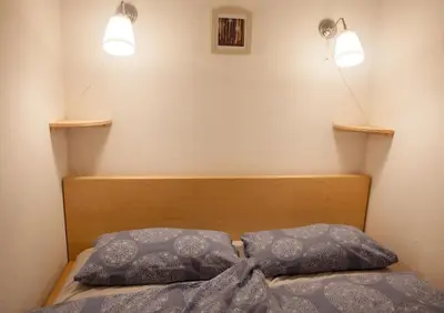 Ein Bett oder Betten in einem Zimmer der Unterkunft Gemütliches 2P-Apartment in ruhiger Lage
