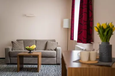 Ein Sitzbereich in der Unterkunft Point Hotel Apartments and Rooms
