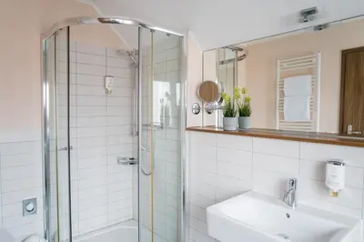 Ein Badezimmer in der Unterkunft Point Hotel Apartments and Rooms