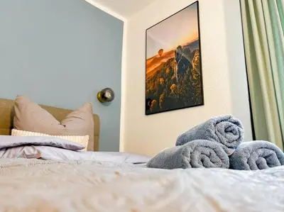 Ein Bett oder Betten in einem Zimmer der Unterkunft Ferienwohnung 4 Personen *Parkplatz, WLAN, Waschmaschine*